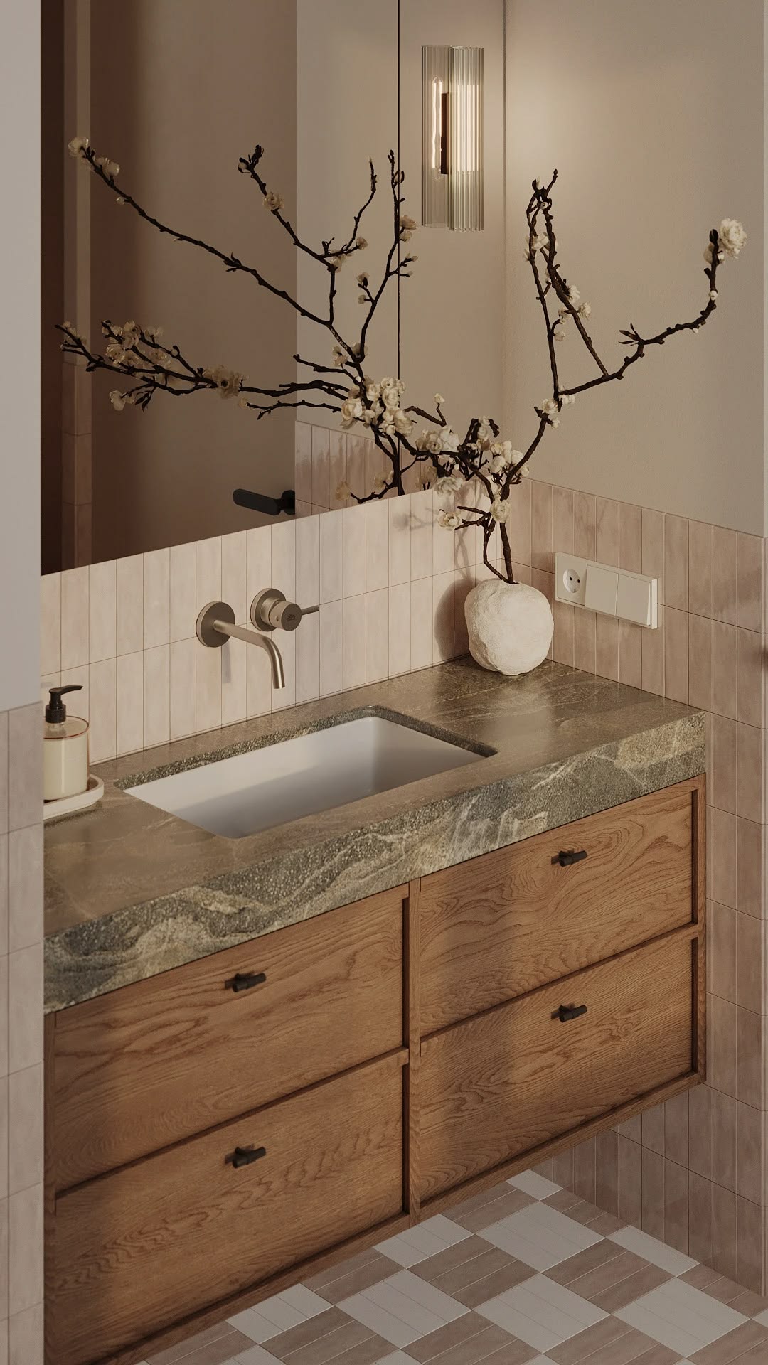 Plan vasque en marbre vert, tiroirs en bois et sol damier — matières naturelles pour une salle de bain durable